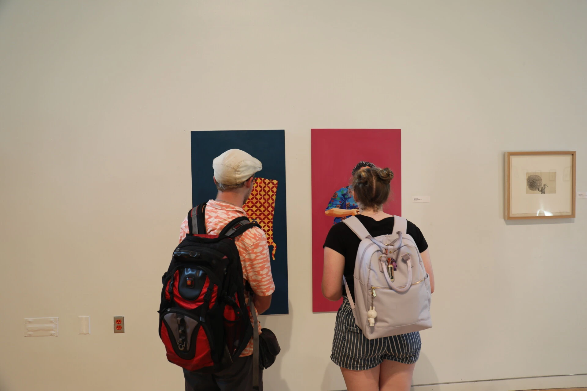 Students looking at art in a gallery