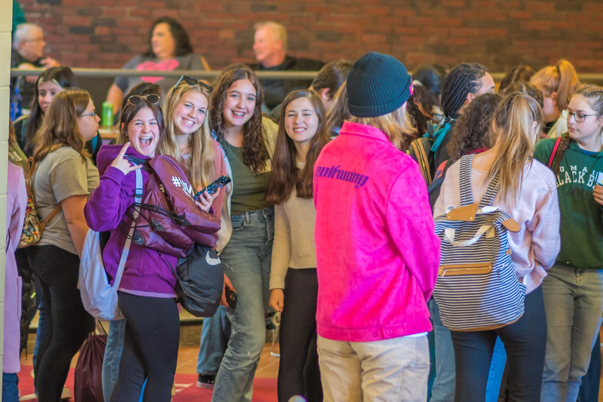 group of students standing together looking at the camera