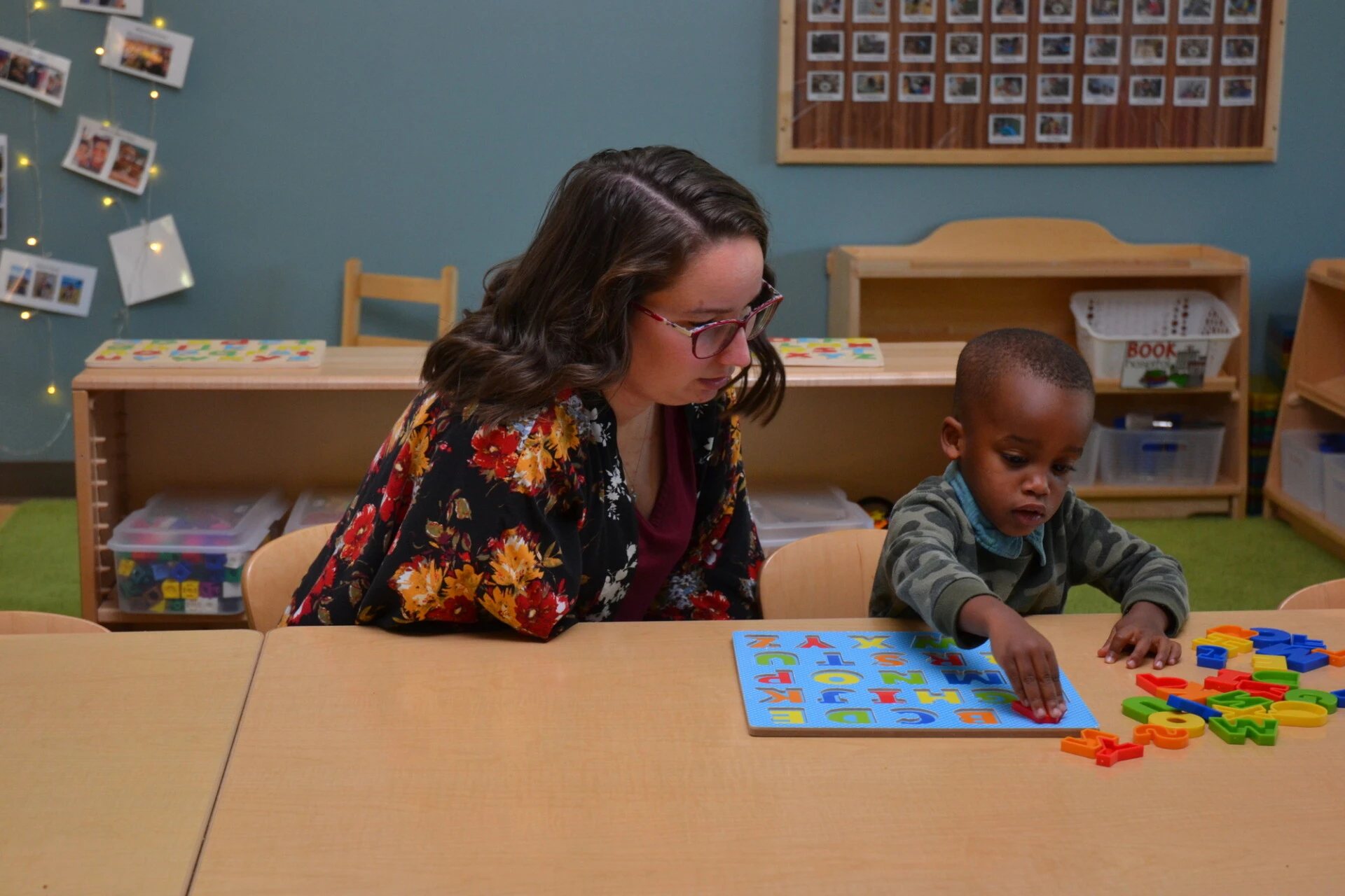 UMF education students works with child for student teaching.