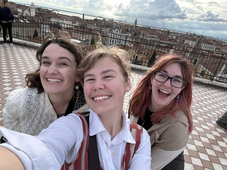 Three Farmington students take selfie in Italy during study abroad session.