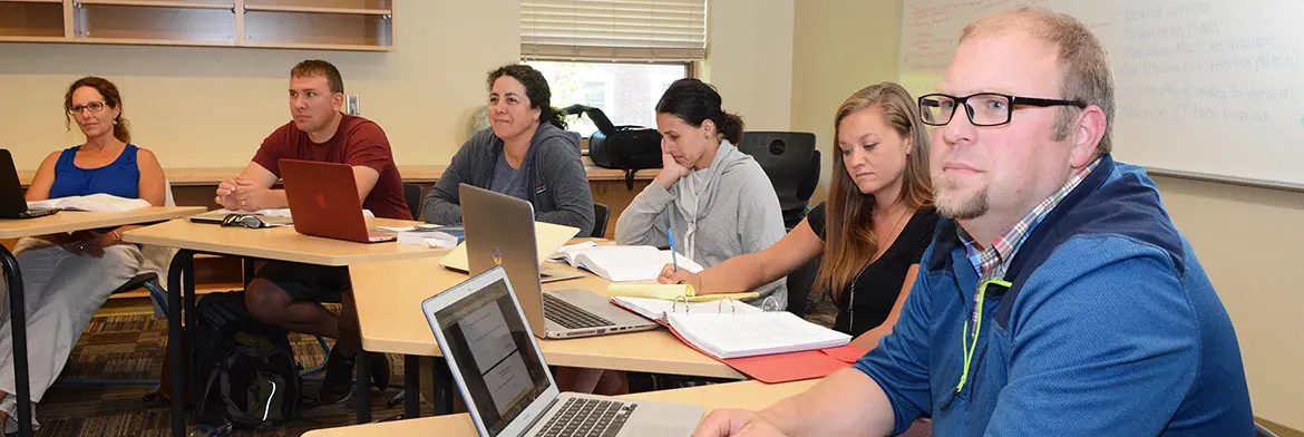 UMF Educational Leadership (M.S. Ed.) students in classroom.
