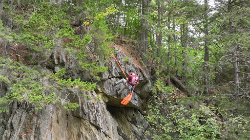 senior in the UMF Outdoor Recreation Business Administration program, displaying his climbing skills